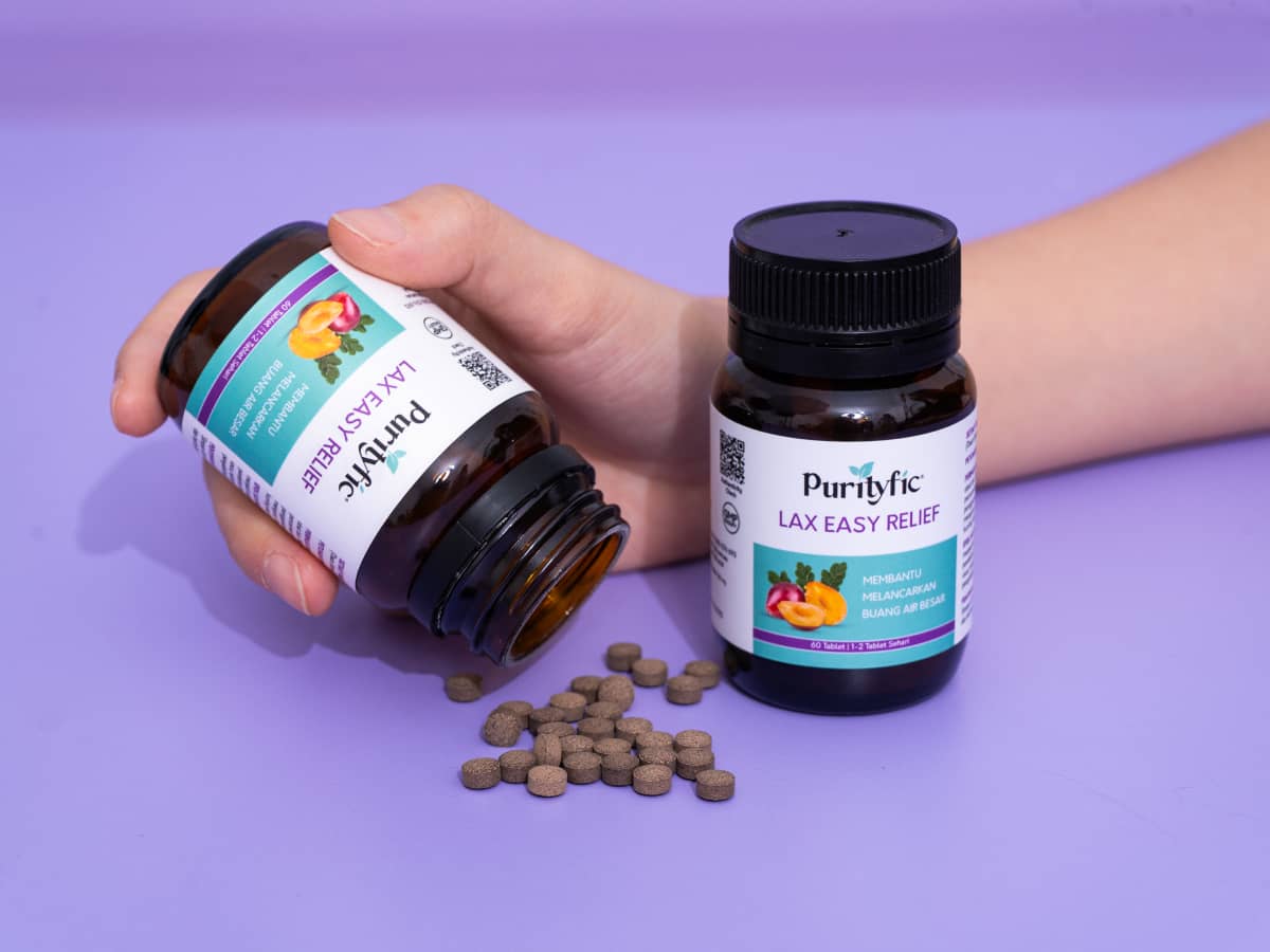 Purityfic Lax Easy Relief 60 Tablet, suplemen yang diformulasikan khusus untuk membantu meredakan gangguan pencernaan seperti sembelit ringan dan diare, serta membantu menjaga fungsi usus yang sehat. 